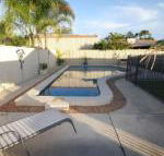 62 Tingira Close Modern lowset home with swimming pool outdoor area ample parking. Pet friendly - Maitland Accommodation